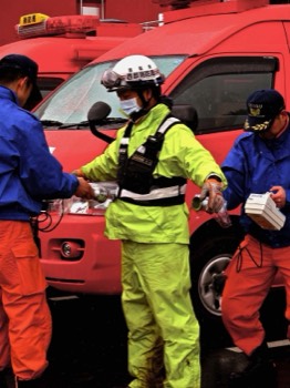  3/15 newly arrived fire brigades checking radiation, staging area for Minami Sanriku operations 